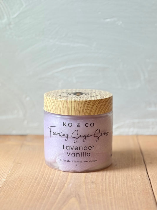 Jar of whipped foaming sugar scrub with a smooth, creamy texture