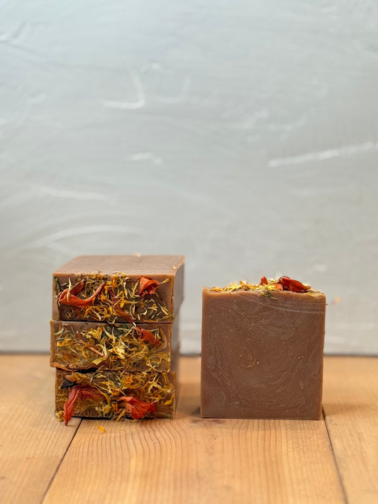 Fall pumpkin spice soap on wooden surface